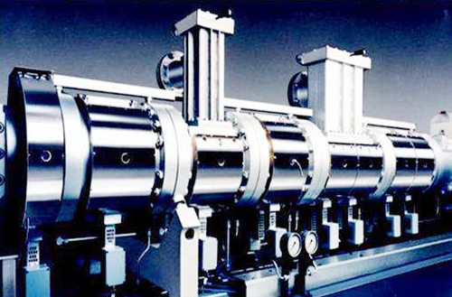 What is the difference between a twin-screw extruder and a single-screw extruder?